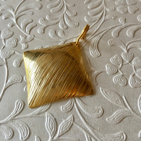 Gold plated pendant